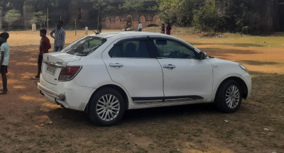 Maruti Suzuki Dzire available for hire in Jhargram